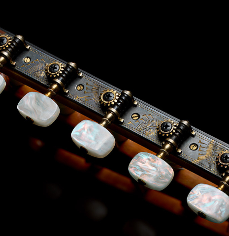 The tuning machines of a 1988 Andrea Tacchi "10-string" classical guitar made of spruce and CSA rosewood