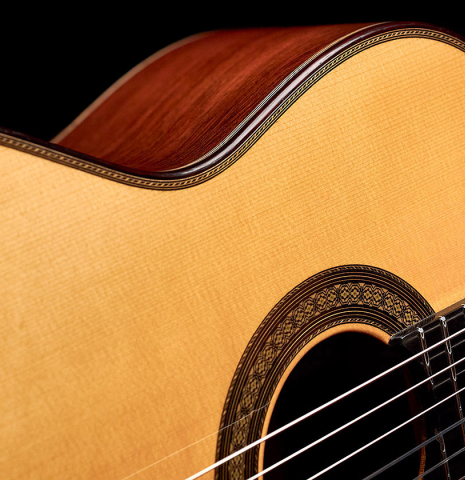 The soundboard and side of 2022 Marco Tejeda "Chamberi" classical guitar made with sprue and African rosewood