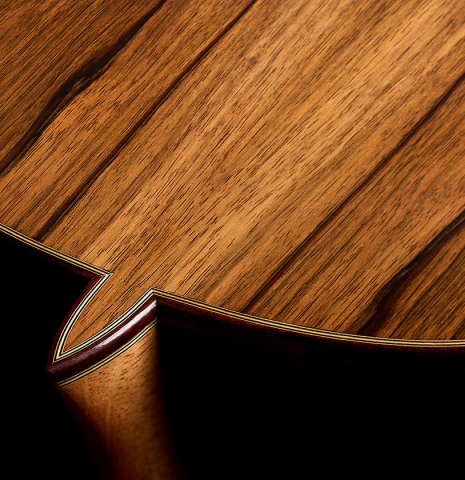 The heel, back binding and purfling of a 2026 Marco Tejeda "Chamberi" classical guitar made of cedar and green ebony