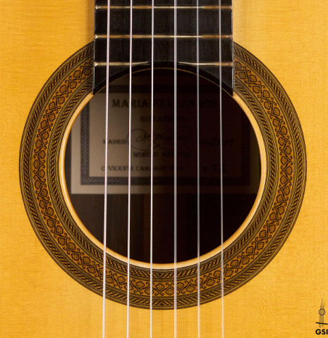 The rosette of a 2009 Mariano Tezanos "Maestro" classical guitar made with spruce and CSA rosewood