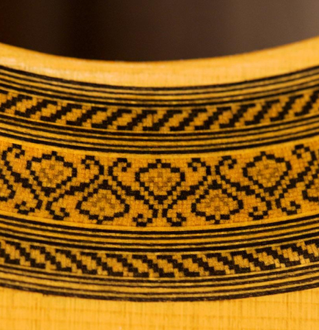 The close-up of a rosette of a 2009 Mariano Tezanos "Maestro" classical guitar made with spruce and CSA rosewood