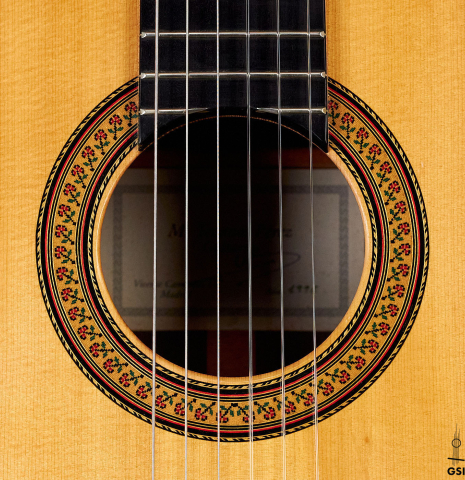 The rosette of a 1996 Tezanos-Perez classical guitar made with Spruce and CSA rosewood
