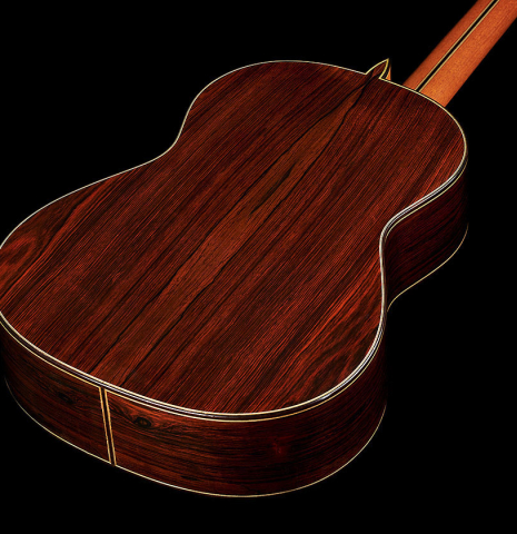 The back and sides of a 2002 Tezanos-Perez classical guitar made with Spruce and CSA rosewood