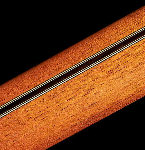 The back of the neck with ebony reinforcement of a 2002 Tezanos-Perez classical guitar made with Spruce and CSA rosewood