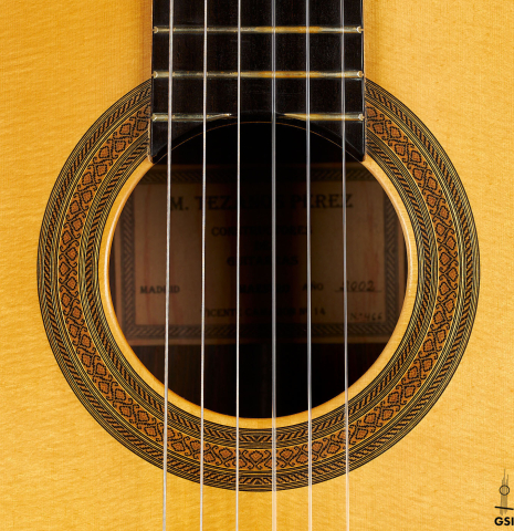 The rosette of a 2002 Tezanos-Perez classical guitar made with Spruce and CSA rosewood
