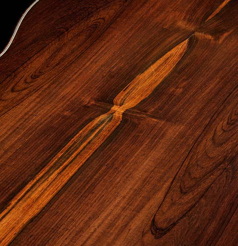 The back center seam of a 2002 Tezanos-Perez "Concierto" classical guitar made with cedar and CSA rosewood