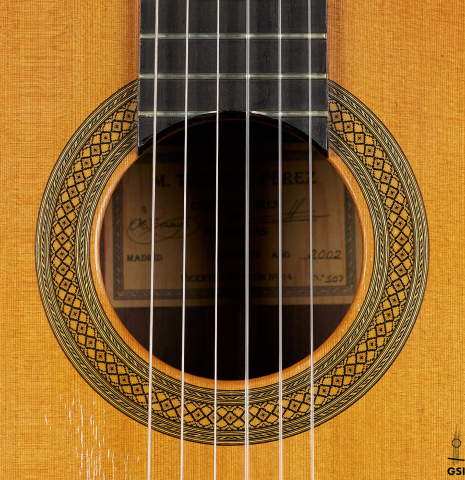 The rosette of a 2002 Tezanos-Perez "Concierto" classical guitar made with cedar and CSA rosewood