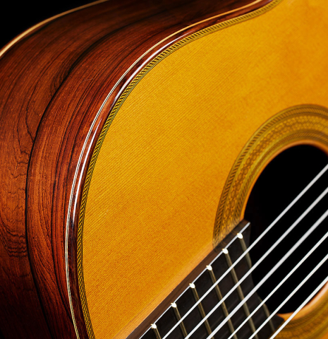 The top, fingerboard and side of a 2006 Mariano Tezanos "Maestro" classical guitar (ex Scott Tennant) made of cedar and CSA rosewood