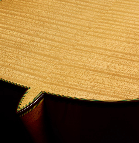 The heel and back binding of a 2010 Sergio Tezanos classical guitar made of spruce and maple
