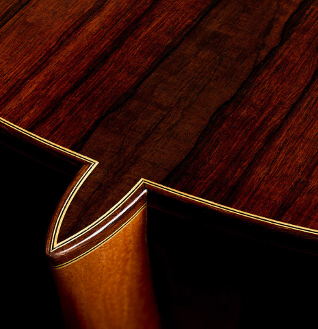 The heel, back binding and purfling of a 2007 Mariano Tezanos "Maestro" classical guitar made with spruce and CSA rosewood