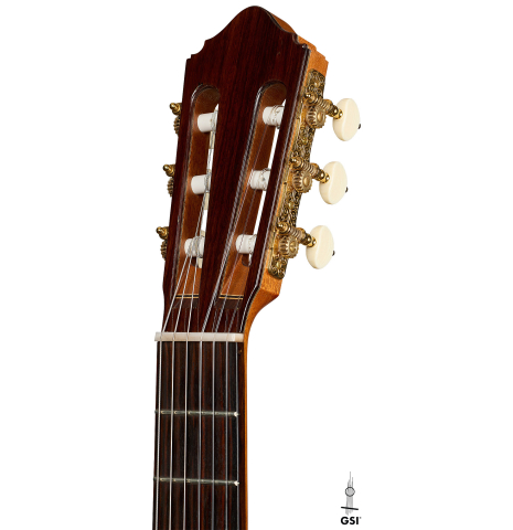The headstock of a 2018 Michael Thames classical guitar made of cedar and Indian rosewood