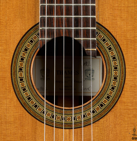 The rosette of a 2018 Michael Thames classical guitar made of cedar and Indian rosewood