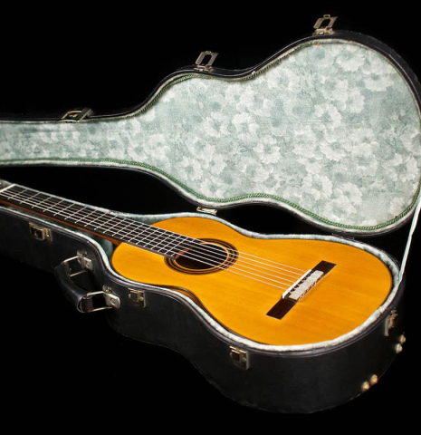 The hardshell case of an 1886 Antonio de Torres w/pegs classical guitar made of spruce and cypress