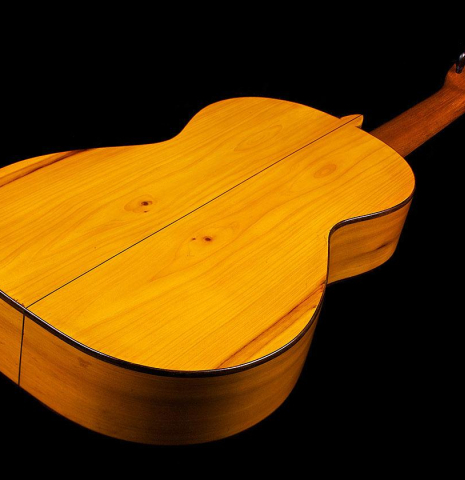 The back and sides at the foot of an 1886 Antonio de Torres w/pegs classical guitar made of spruce and cypress