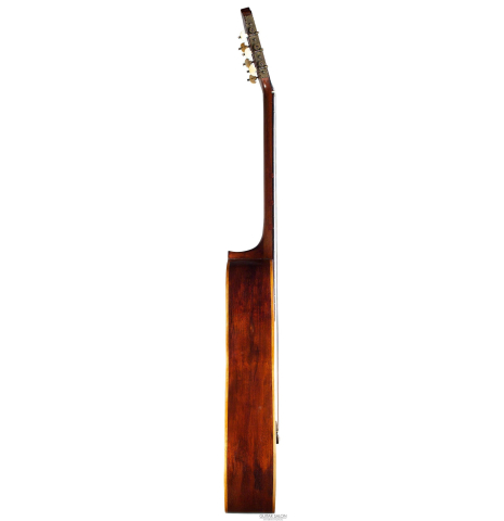 The side of an 1888 Antonio de Torres SP/MH SE 115 classical guitar.