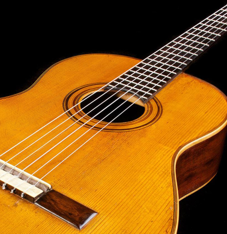 The front of an 1888 Antonio de Torres SP/MH SE 115 classical guitar.