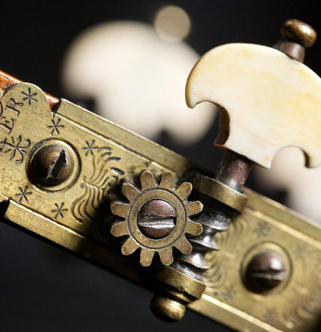 The machine heads of an 1888 Antonio de Torres SP/MH SE 115 classical guitar.