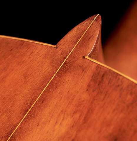 The upper back and heel of an 1887 Antonio de Torres SP/MH SE 105 classical guitar.