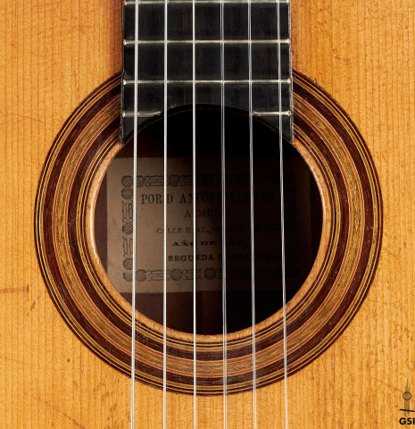 The rosette of a 1887 Antonio de Torres SP/MH SE 105 classical guitar.