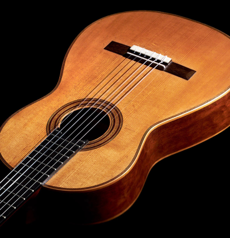 The front and sides of an 1887 Antonio de Torres SP/MH SE 105 classical guitar.