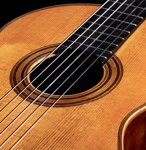The top, rosette and fingerboard of an 1887 Antonio de Torres SP/MH SE 105 classical guitar.