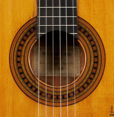The rosette of a 1867 Antonio de Torres classical guitar made of spruce and maple