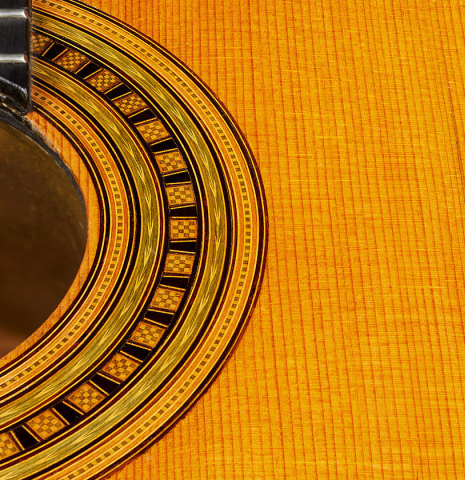 Detailed closeup of the rosette of a 1867 Antonio de Torres classical guitar made of spruce and maple