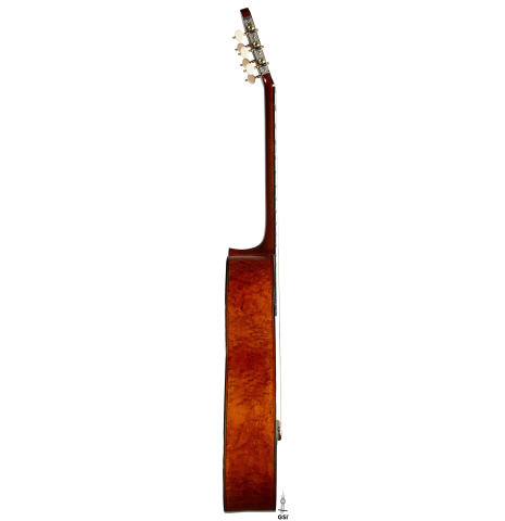 The side of a 1867 Antonio de Torres classical guitar made of spruce and maple
