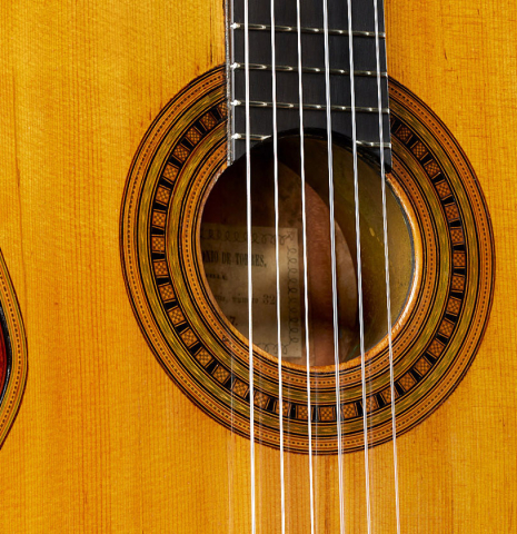 The top, tornavoz and rosette of a 1867 Antonio de Torres classical guitar made of spruce and maple