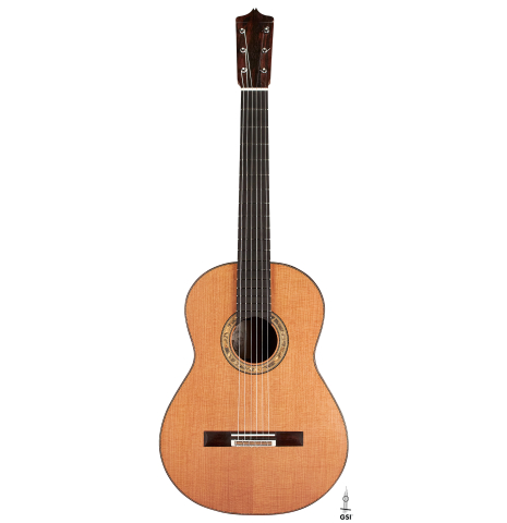 The front of a 2016 Dake Traphagen made with cedar and CSA rosewood featuring traditional pegs.