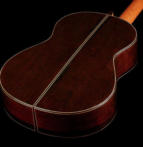The back and sides of a 2023 Dake Traphagen classical guitar made of cedar and CSA rosewood