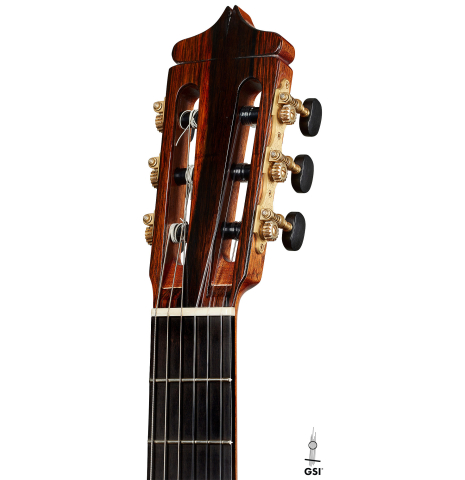 The headstock of a 2023 Dake Traphagen classical guitar made of cedar and CSA rosewood
