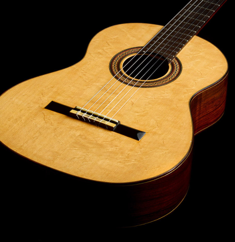 The soundboard and sides of a 1981 Dake Traphagen classical guitar made of spruce and CSA rosewood