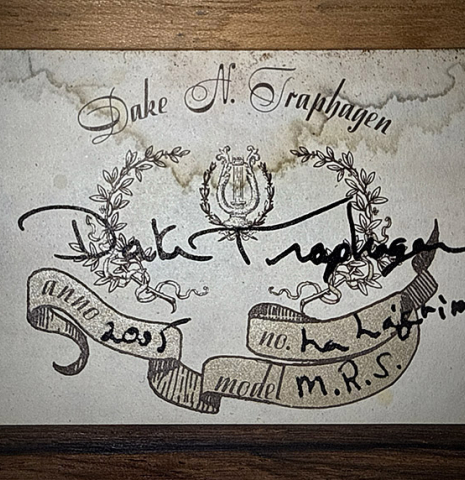 The label of a 2005 Dake Traphagen classical guitar made of spruce and African rosewood