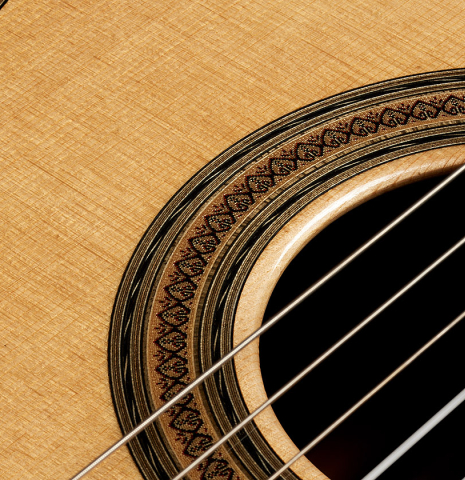 Closeup of the rosette of a 2024 Oscar Trezzini "Friederich/Lagoya" classical guitar made of spruce and CSA rosewood
