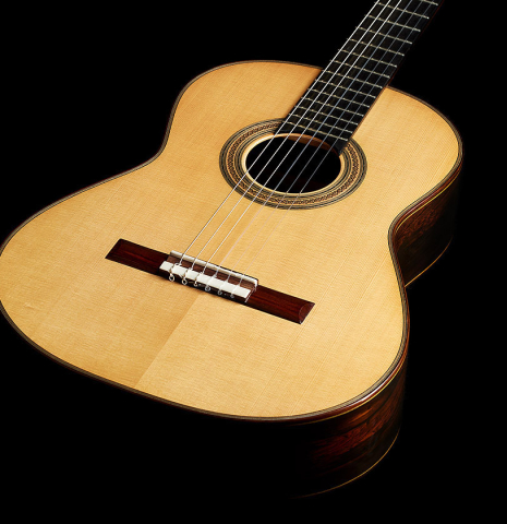 The soundboard of a 2024 Oscar Trezzini "Friederich/Lagoya" classical guitar made of spruce and CSA rosewood