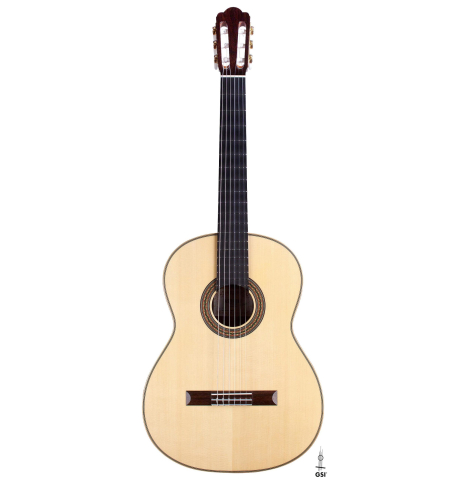 The front of a Wataru Tsuji "S-2" SP/IN made with spruce top and Indian rosewood back and sides on a white background