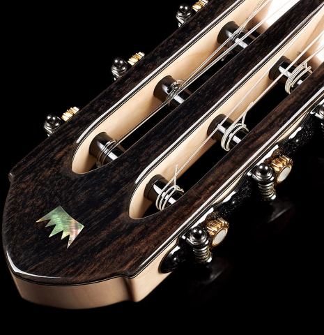 The headstock of a 2019 Rafal Turkowiak classicalg guitar made with spruce top and Makassar Ebony back and sides.