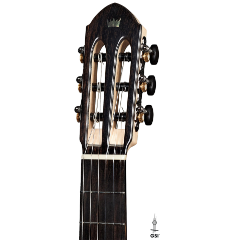 The headstock of a 2019 Rafal Turkowiak classicalg guitar made with spruce top and Makassar Ebony back and sides.