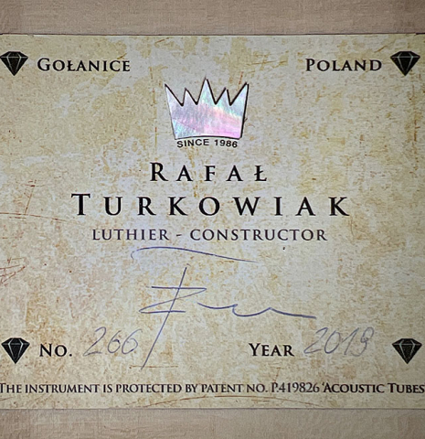The label of a 2019 Rafal Turkowiak classicalg guitar made with spruce top and Makassar Ebony back and sides.