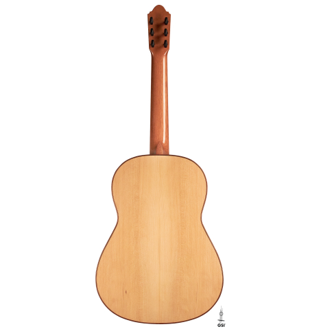 This is the cypress back of a 2020 Mark Usherovich w/pegs classical guitar on a white background.