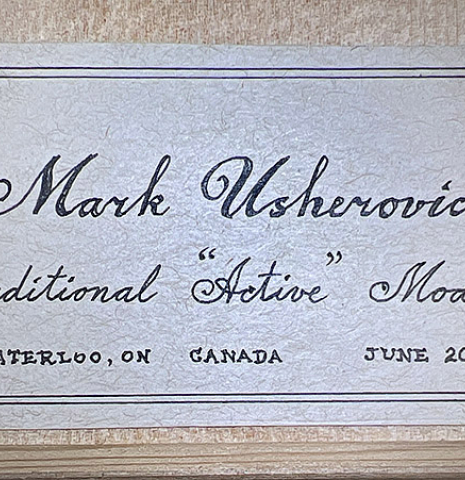 This is the label of a 2020 Mark Usherovich w/pegs classical guitar made with spruce top and cypress back and sides