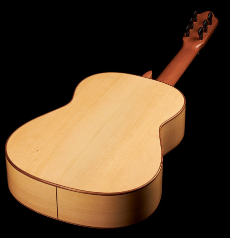This is the back and sides of a 2020 Mark Usherovich w/pegs classical guitar made with spruce top and cypress back and sides