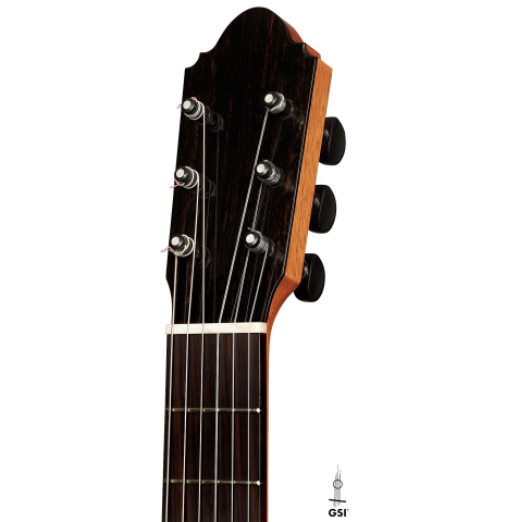 This is the headstock and tuners of a 2020 Mark Usherovich w/pegs classical guitar made with spruce top and cypress back and sides