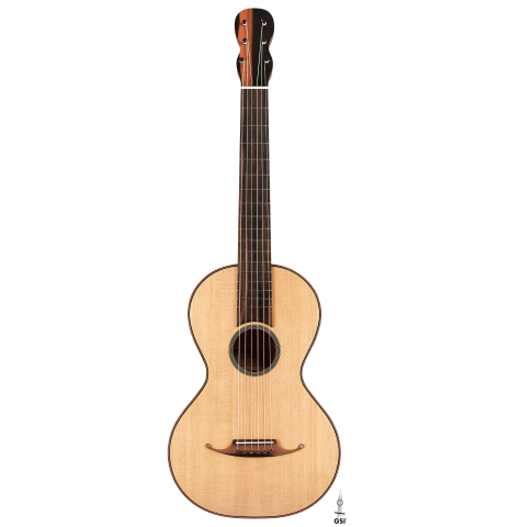 This is the spruce top of a 2022 Mark Usherovich "Romantic" classical guitar on a white background.