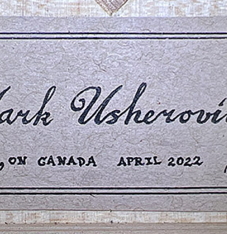 This is the label of a 2022 Mark Usherovich "Romantic" classical guitar made with spruce top and maple back and sides