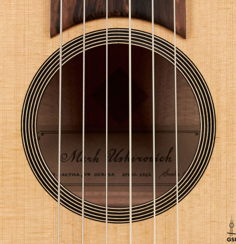 This is the rosette of a 2022 Mark Usherovich "Romantic" classical guitar made with spruce top and maple back and sides