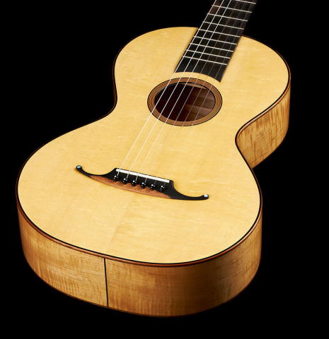 The soundboard of a 2024 Mark Usherovich "Romantic" classical guitar made of spruce and maple