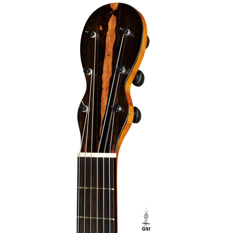 The headstock of a 2024 Mark Usherovich "Romantic" classical guitar made of spruce and maple