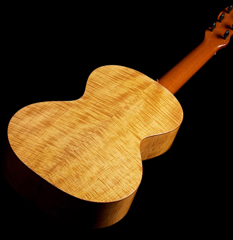 The back and sides of a 2024 Mark Usherovich "Romantic" classical guitar made of spruce and maple